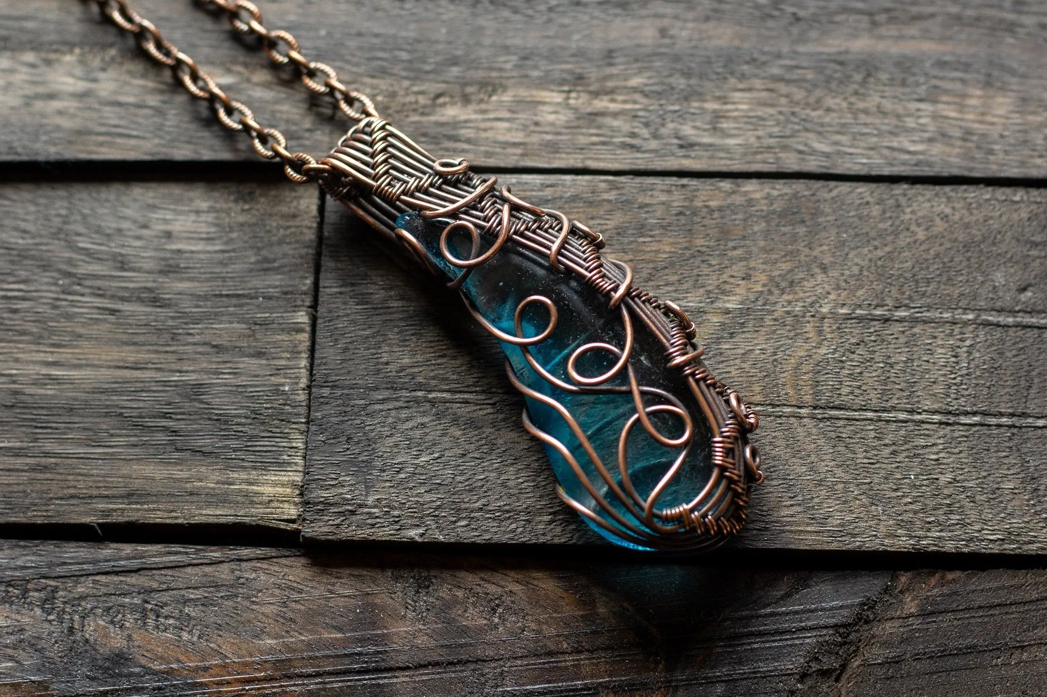 Abstract Copper Wire Wrapped Pendant with Transparent Blue Fused Glass