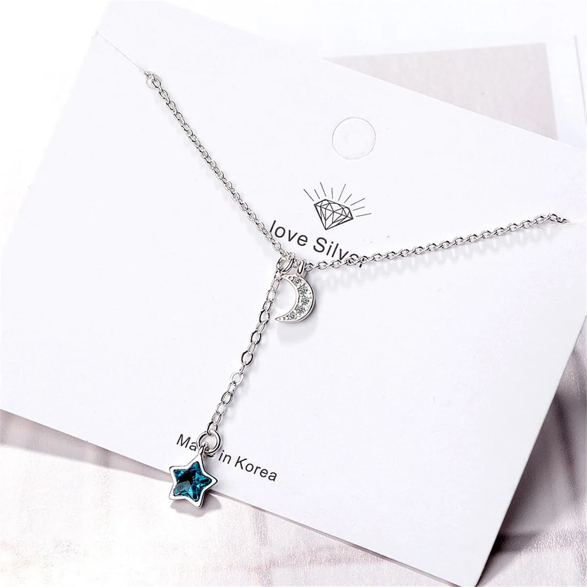Blue Crystal & Cubic Zirconia Moon Pendant Necklace