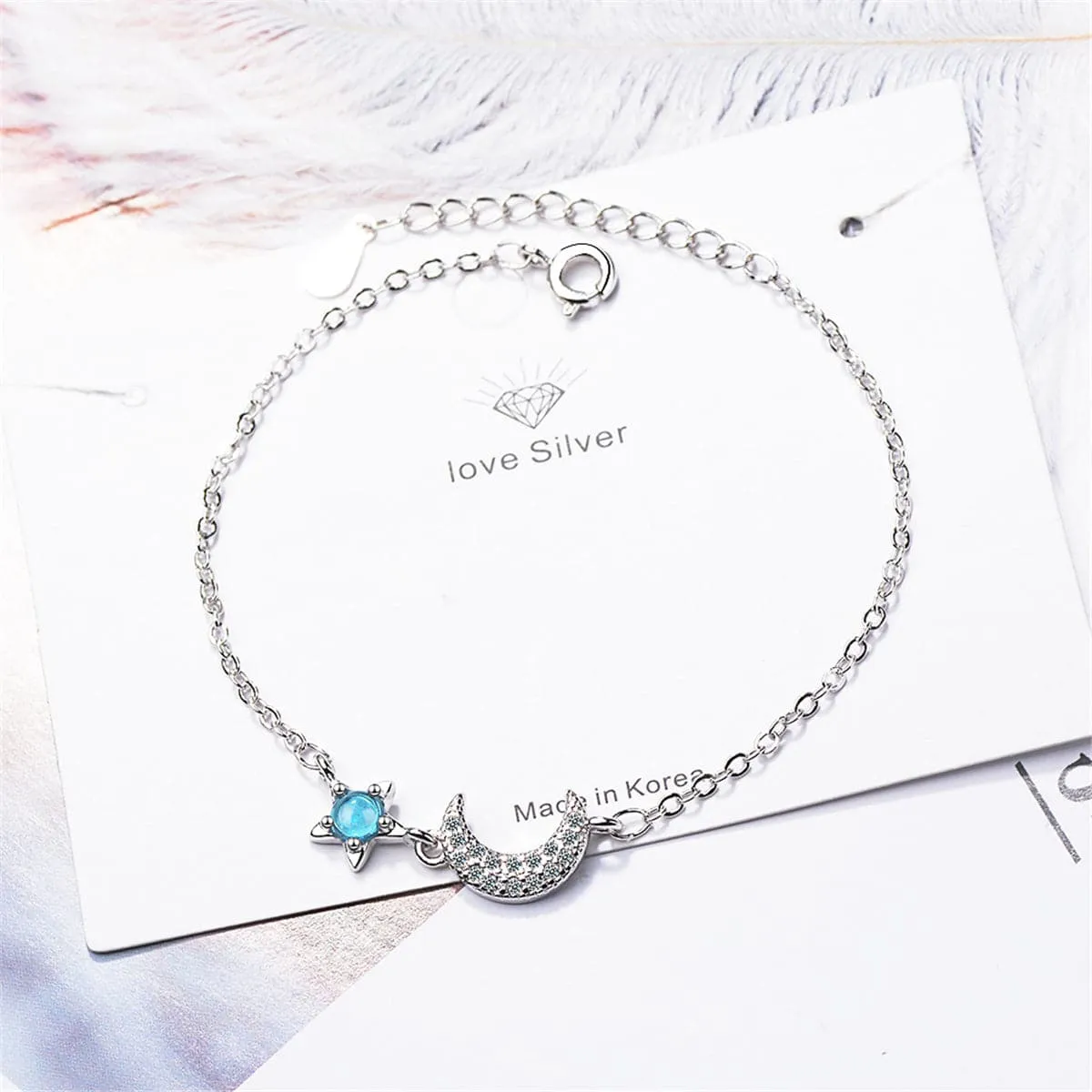 Blue Crystal & Cubic Zirconia Star & Moon Bracelet