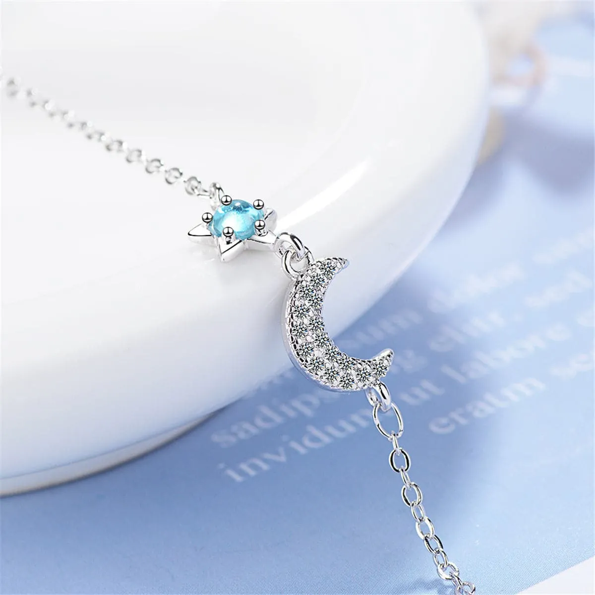 Blue Crystal & Cubic Zirconia Star & Moon Bracelet