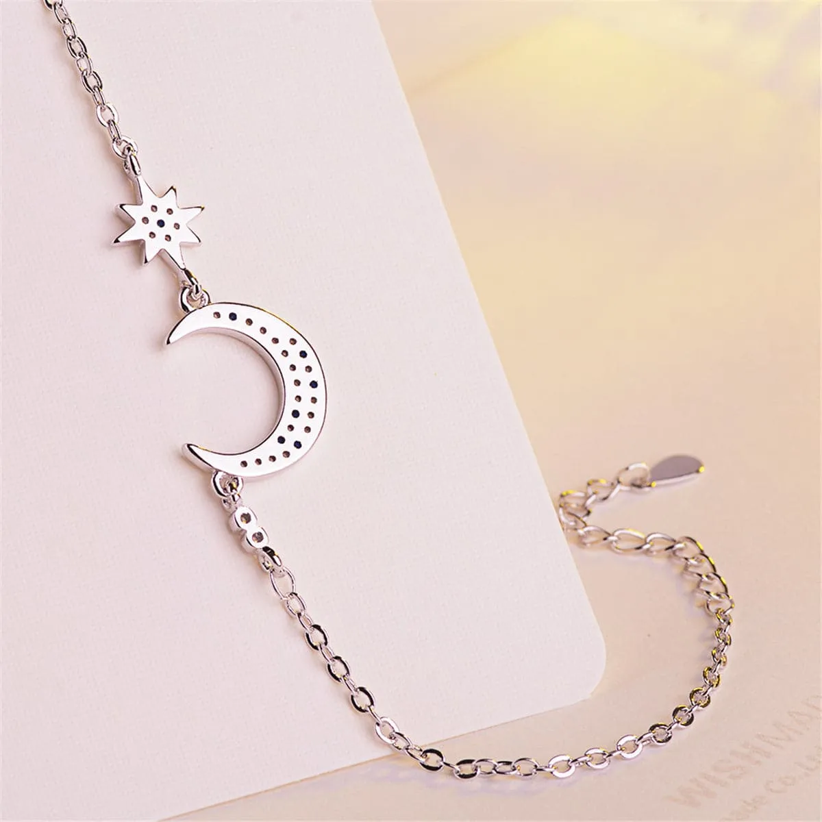 Blue Crystal & Silver-Plated Star & Crescent Moon Bracelet