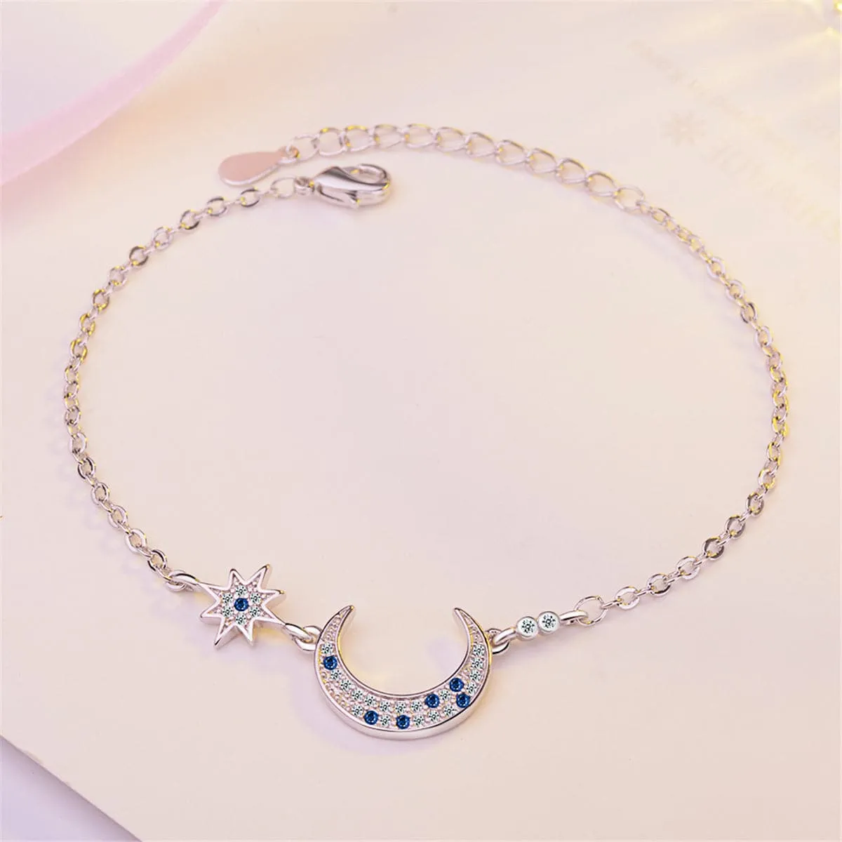 Blue Crystal & Silver-Plated Star & Crescent Moon Bracelet