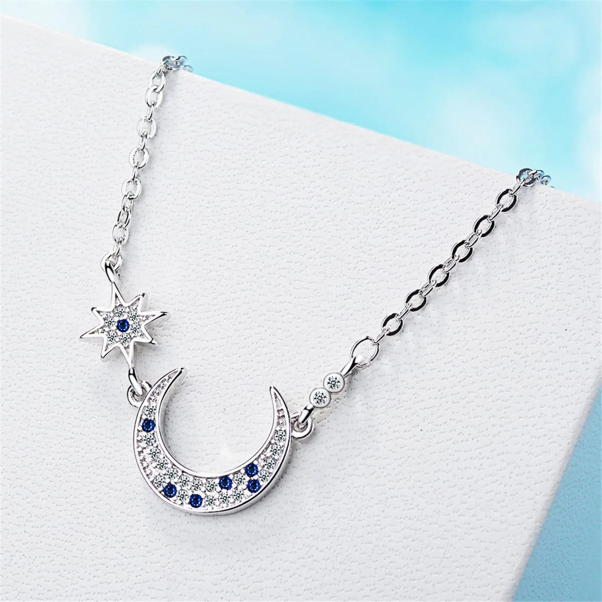 Blue Crystal & Silver-Plated Star & Crescent Moon Bracelet