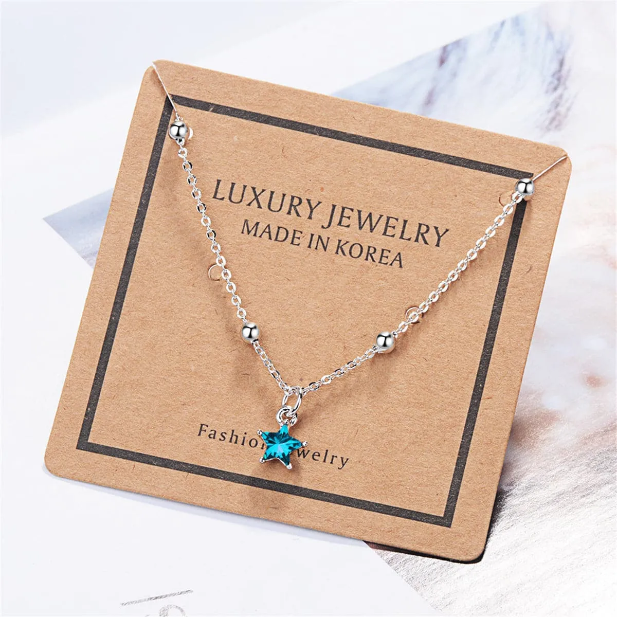 Blue Crystal & Silver-Plated Star Bracelet