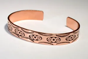 Copper cuff bracelet imprinted with Native American Handmade Metal Stamps