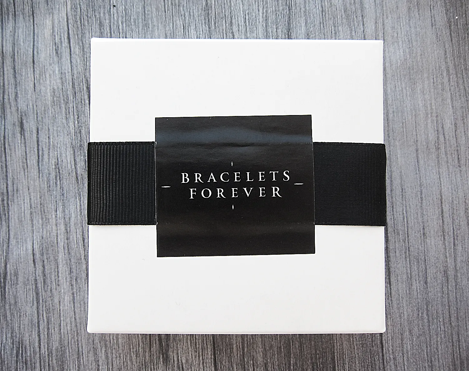 Fashionable Batman bracelet with black smooth onyx and tiger eye beads