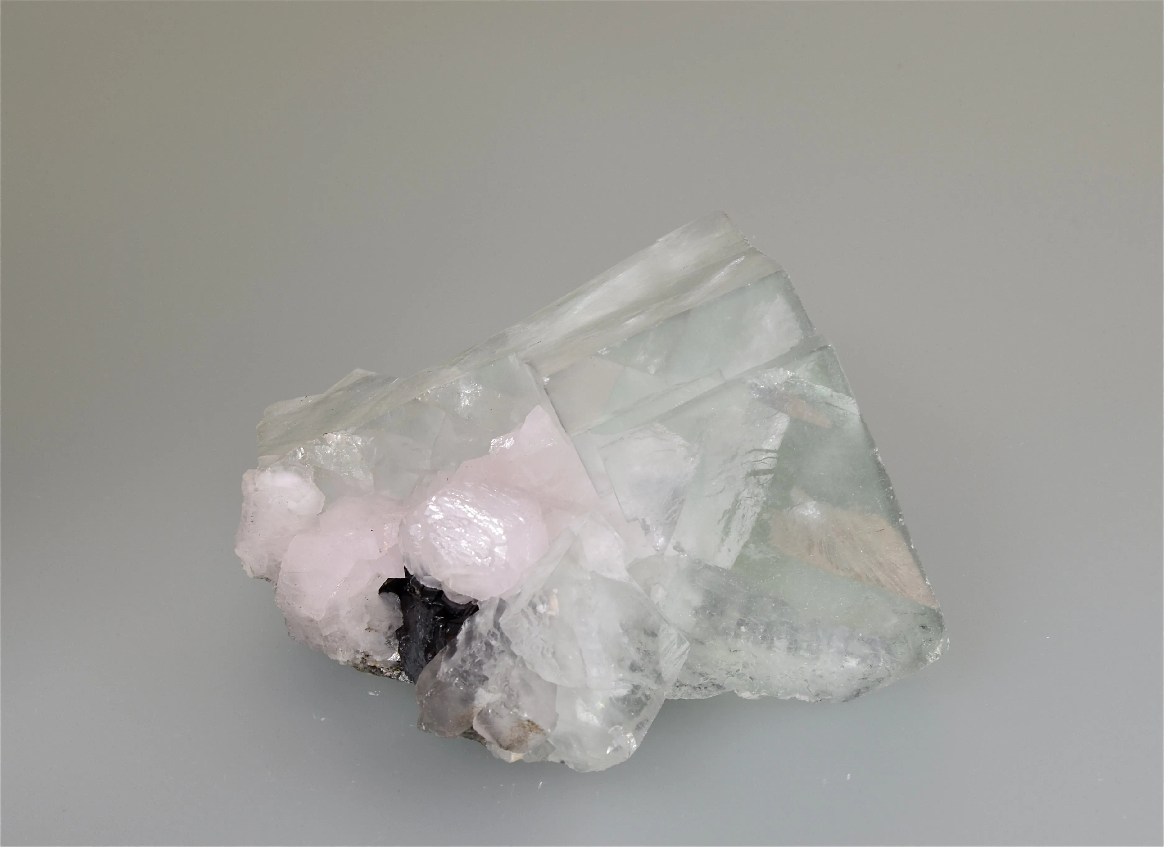 Fluorite and Calcite with Sphalerite, Sovietskiy Mine, Dal'negorsk, Primorskiy Kray, Russia, Mined c. 1995, Small Cabinet 5.7 x 7.5 x 8.5 cm, $250. Online 11/1