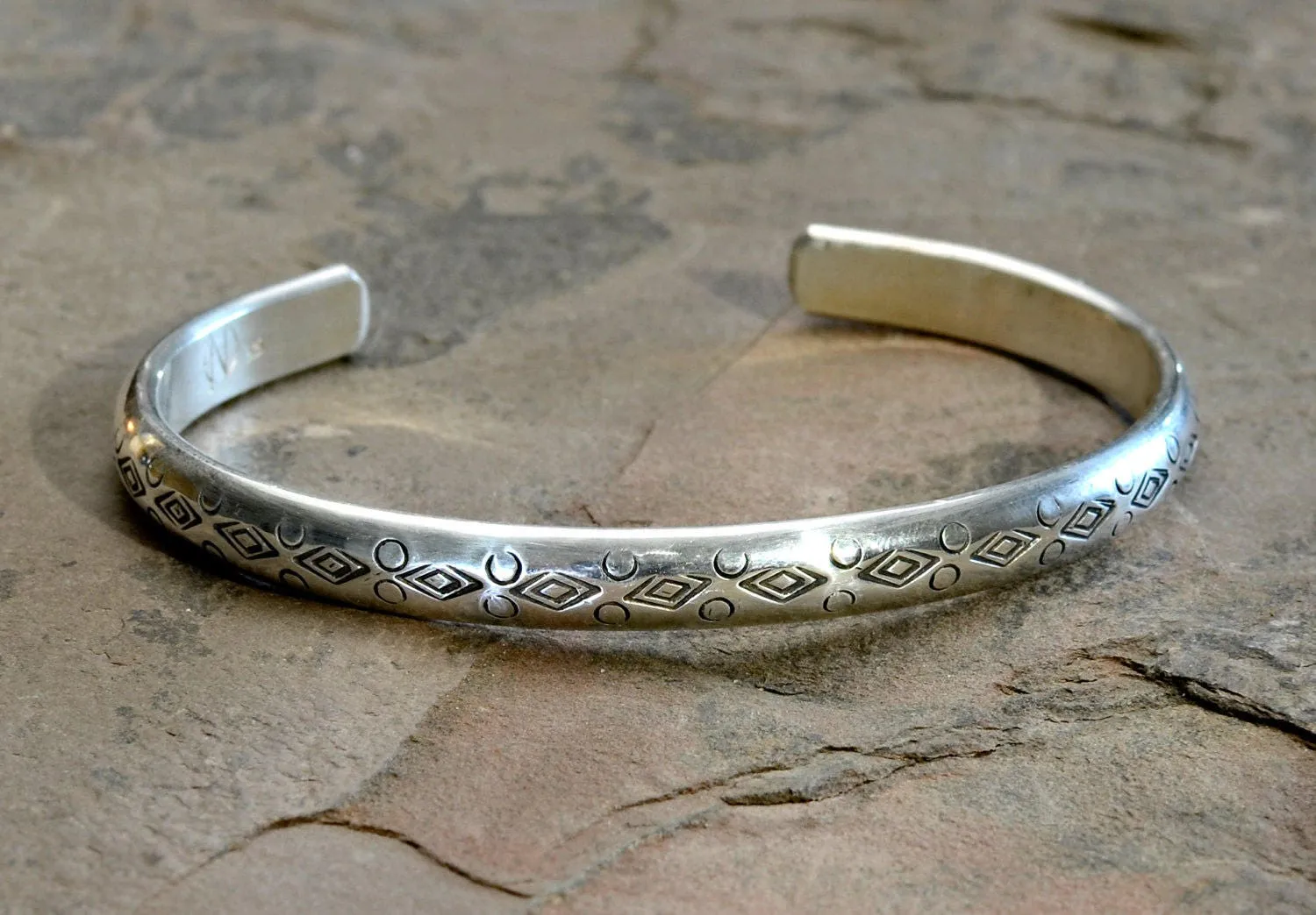 Half Round Cuff Bracelet in Sterling Silver imprinted using Handmade Native American Metal Stamps