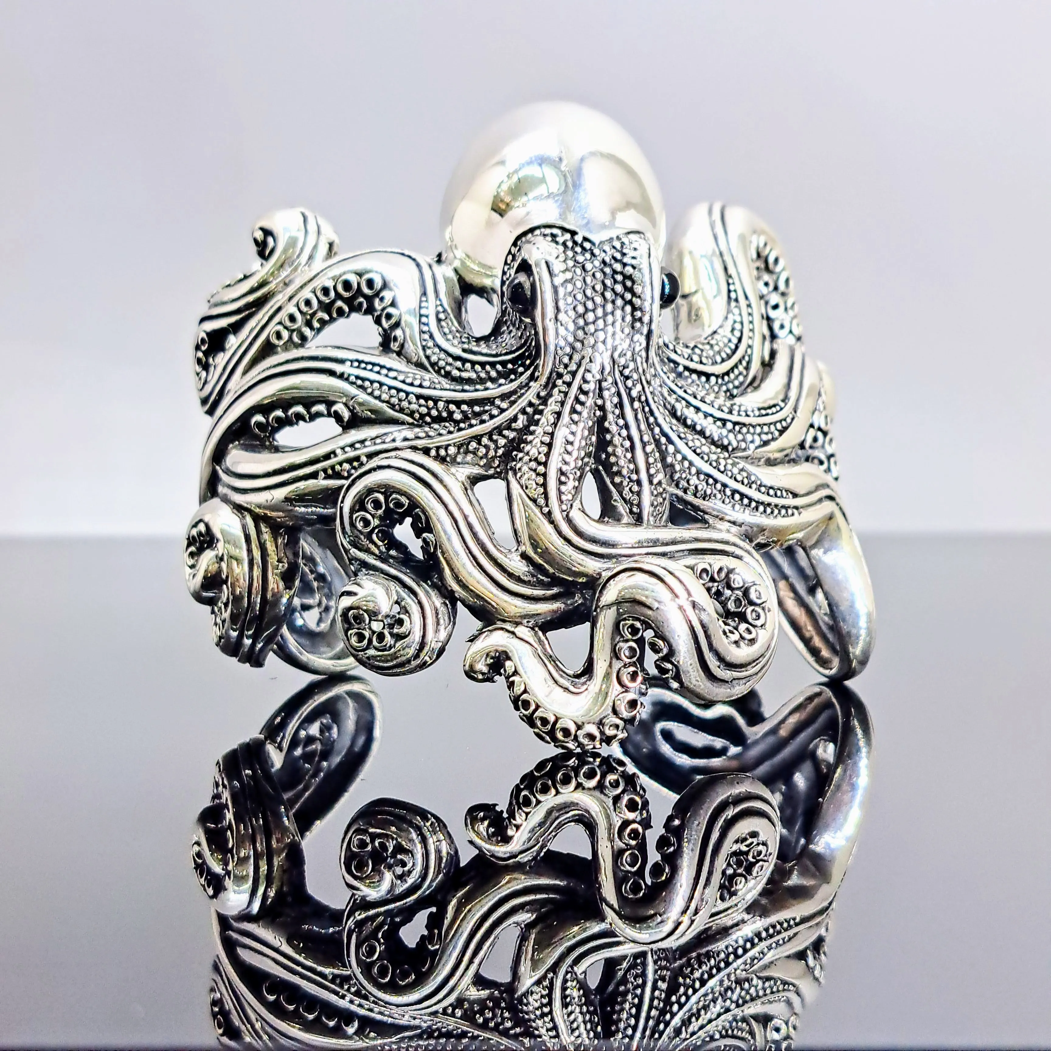 "The Kraken" Sz Med to Lg Bracelet - Sterling Silver, Onyx Eyes