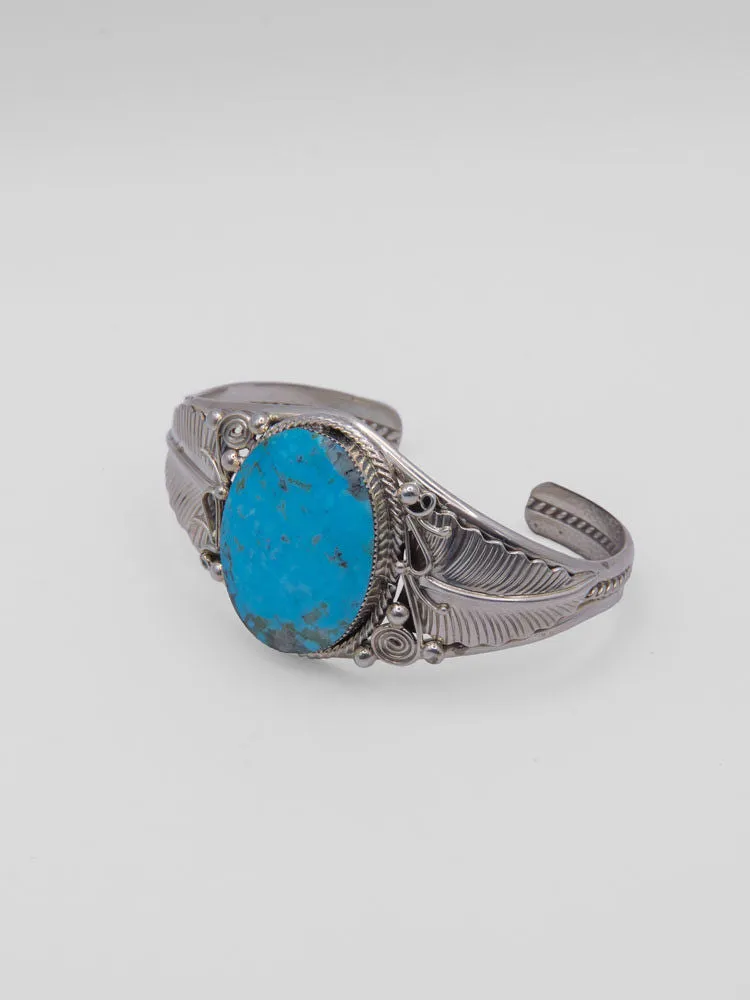 Shiny Cuff with Single Turqoise Stone