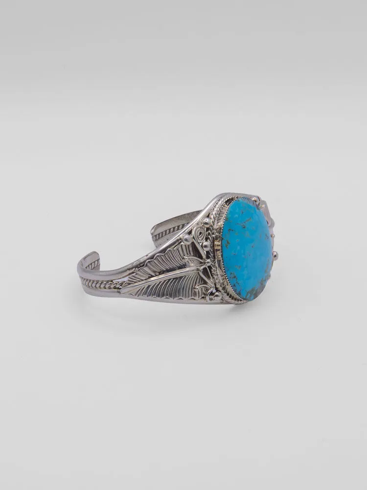 Shiny Cuff with Single Turqoise Stone