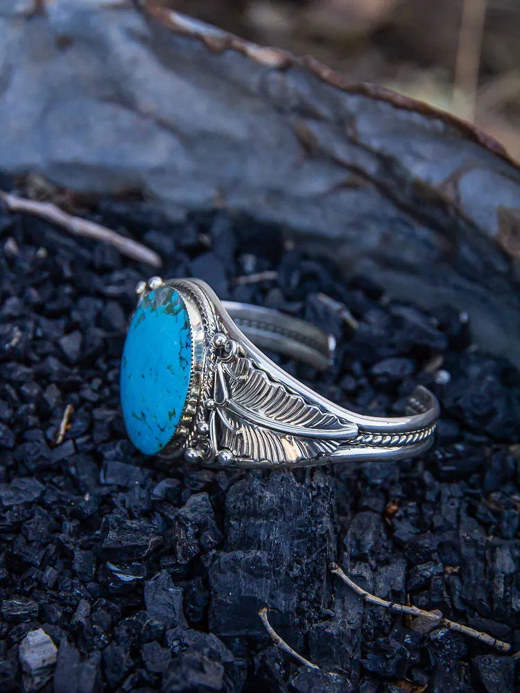 Shiny Cuff with Single Turqoise Stone