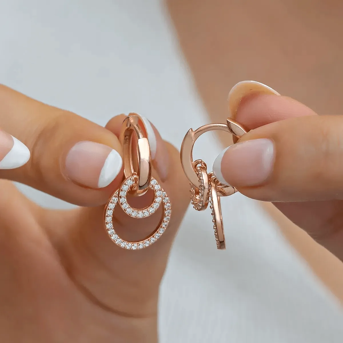 Silver Huggie Hoop Earrings with Dangling Zirconia Circles
