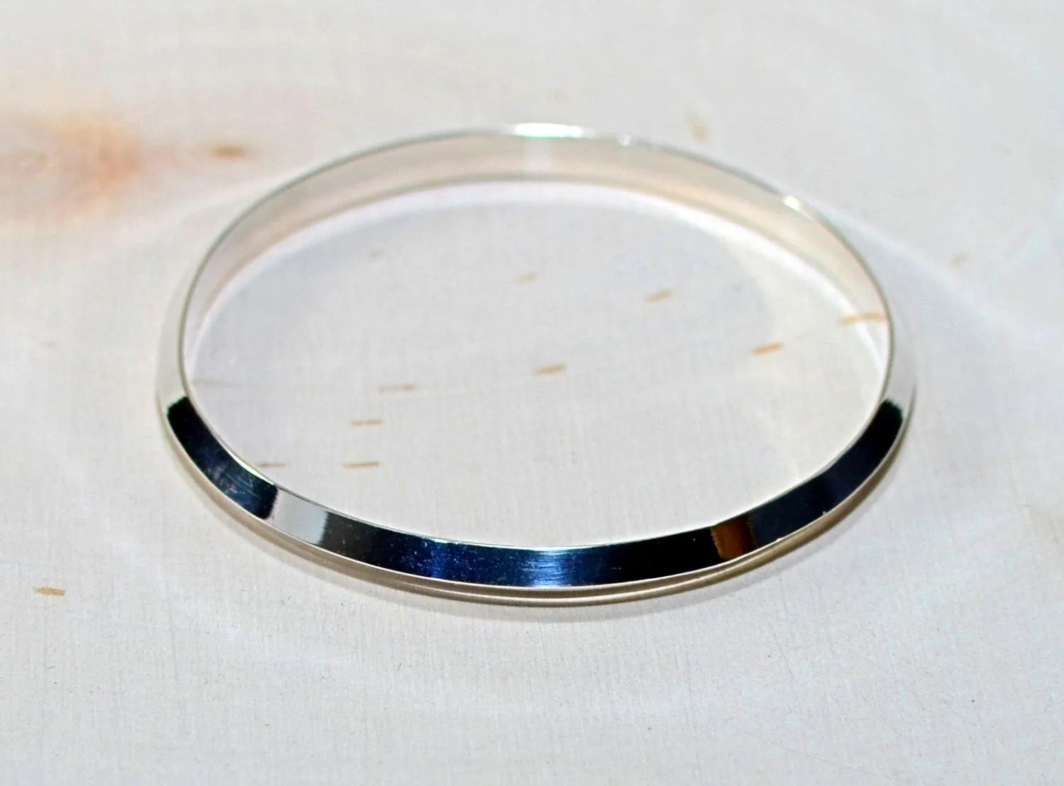 Triangular wire sterling silver bangle