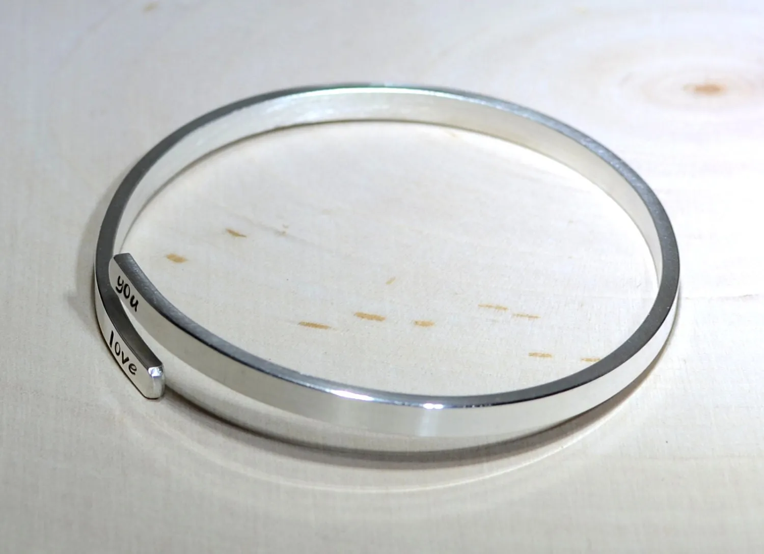 Upper arm cuff in sterling silver with personalizations