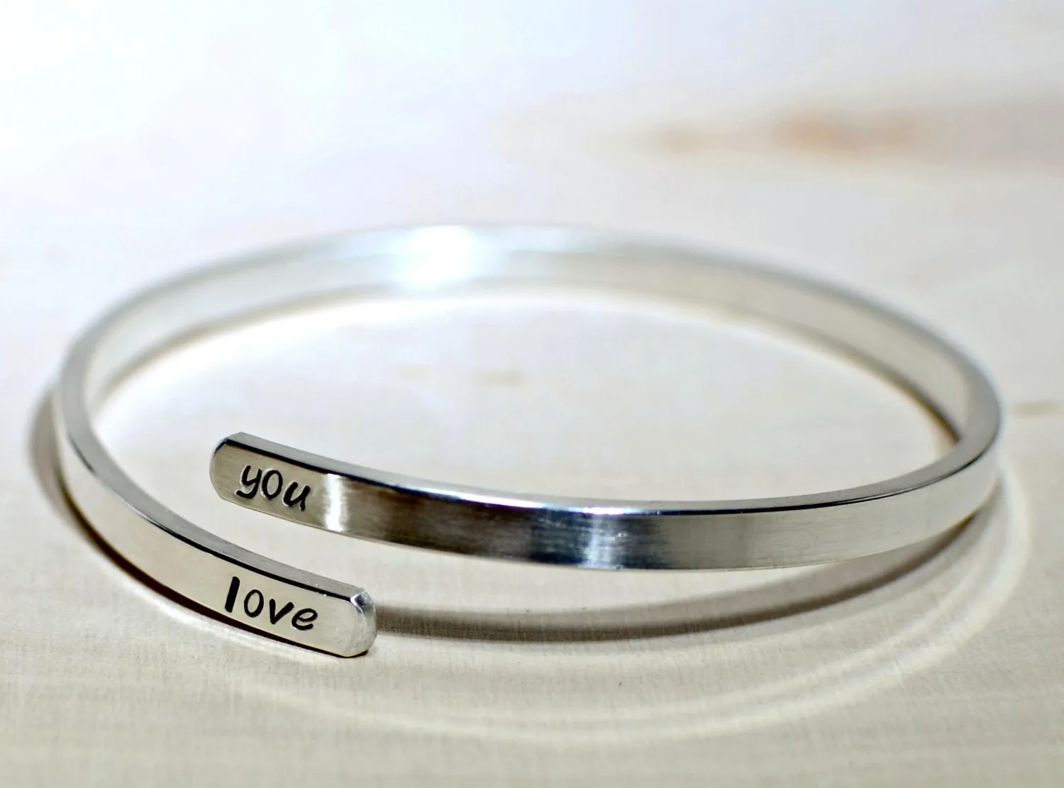 Upper arm cuff in sterling silver with personalizations