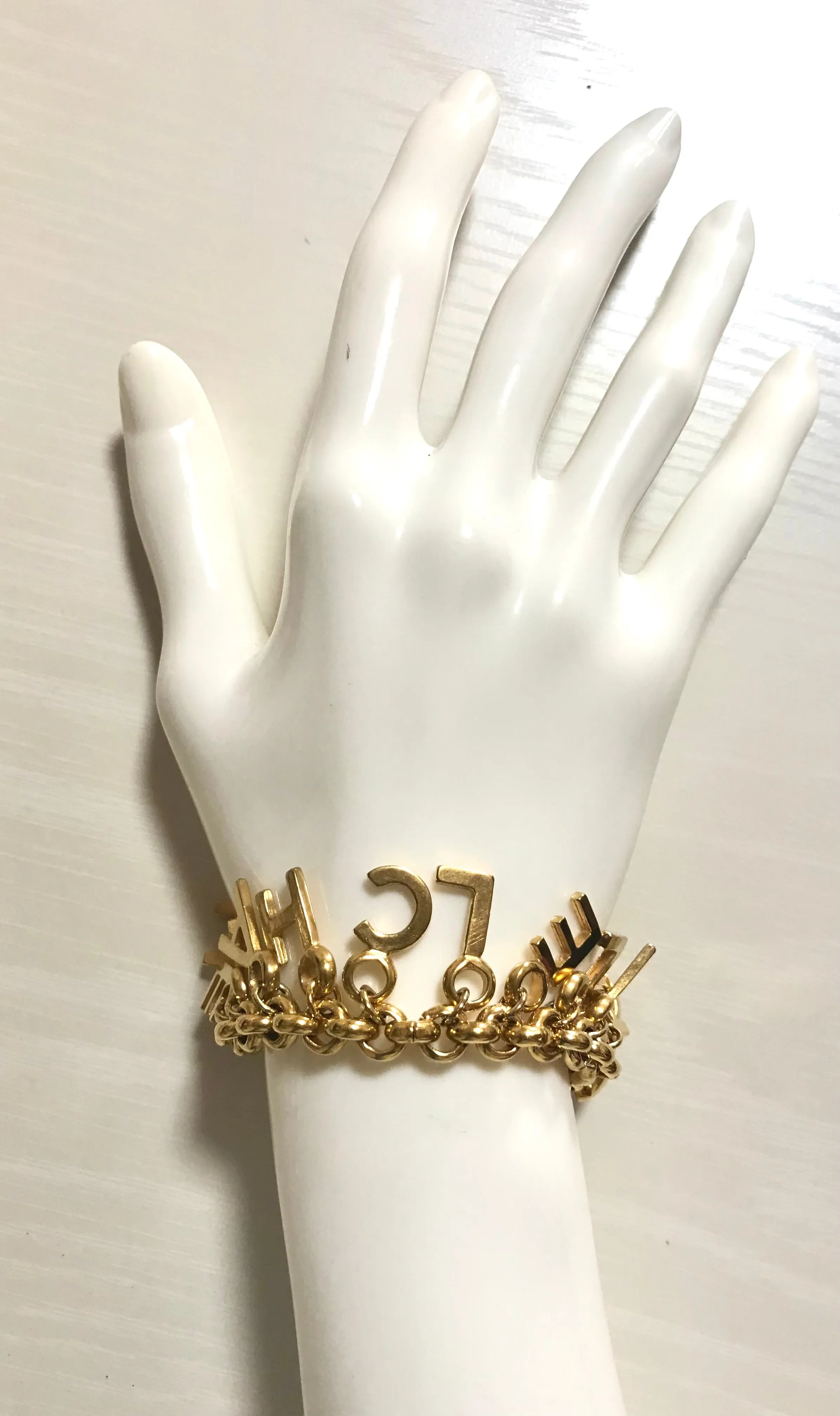 Vintage Chanel Turnlock CC closure and CHANEL letter dangle bracelet. Must have 90s jewelry. CC and logo letter charm bracelet. 060801re