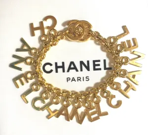 Vintage Chanel Turnlock CC closure and CHANEL letter dangle bracelet. Must have 90s jewelry. CC and logo letter charm bracelet. 060801re