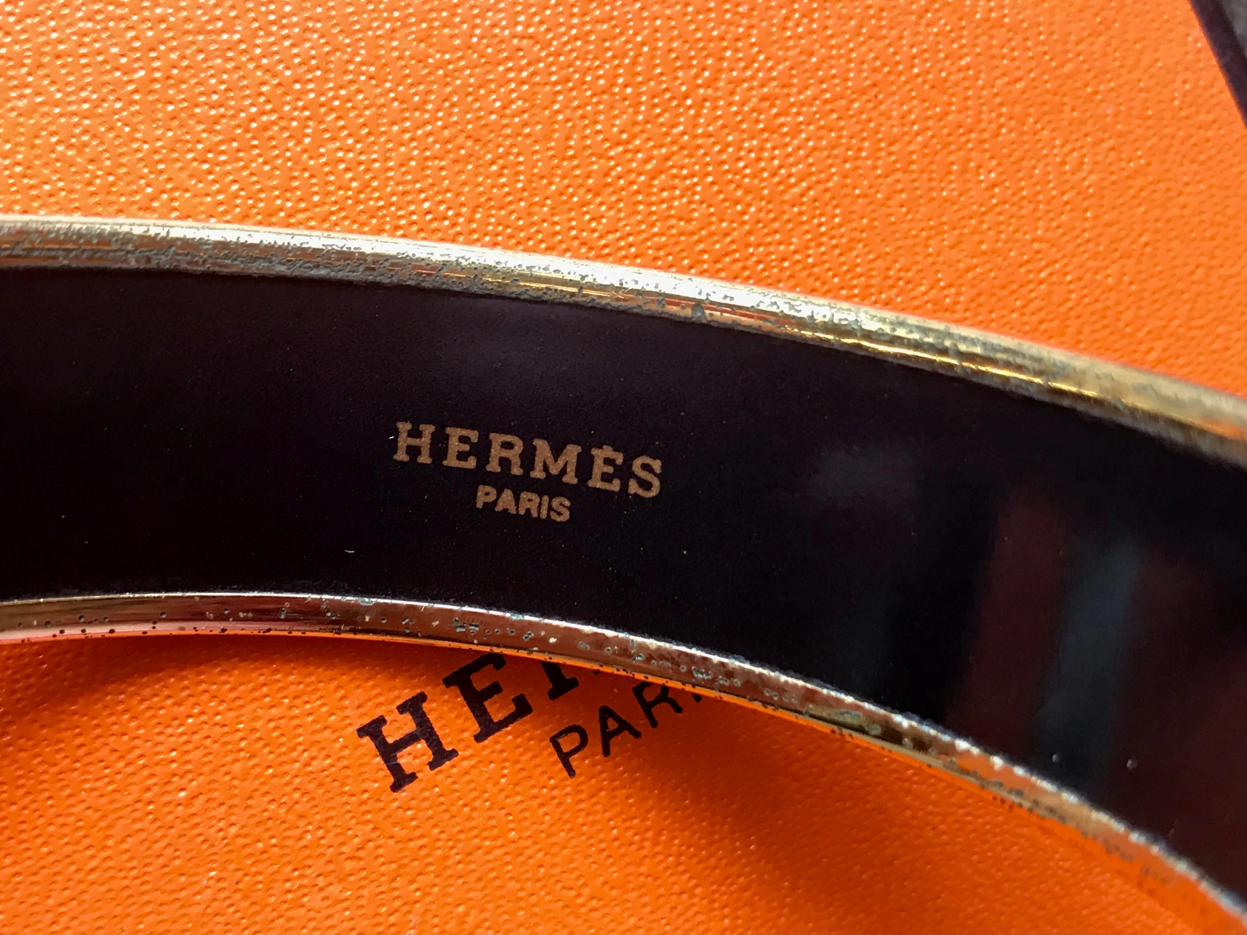 Vintage Hermes golden enamel and cloisonne bangle, bracelet with blue, purple, green etc. Scissors and woven tape motifs. 060426re