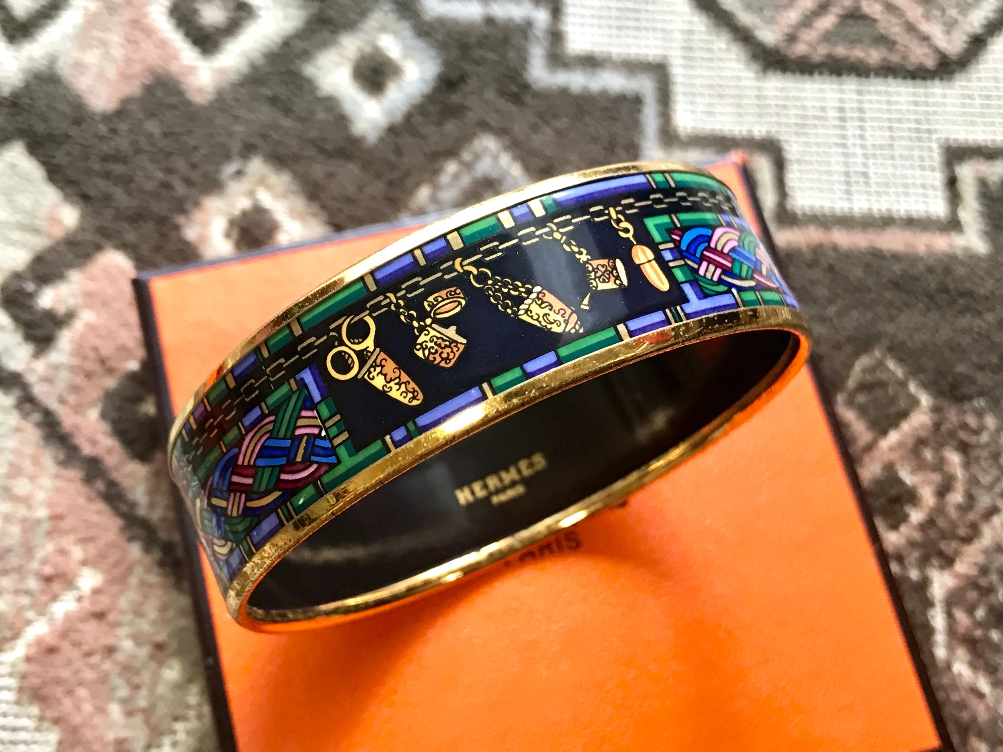 Vintage Hermes golden enamel and cloisonne bangle, bracelet with blue, purple, green etc. Scissors and woven tape motifs. 060426re