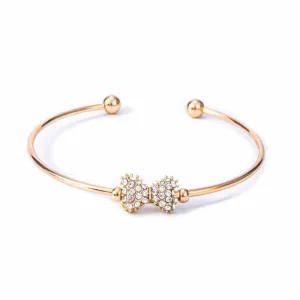 Zela Rhinestone Bow Golden Cuff Bracelet